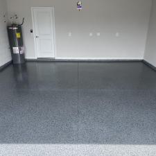 Englewood-Garage-Flooring-Polyaspartic-with-Nightfall-Flakes 0