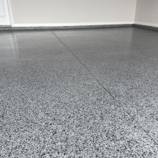 Englewood-Garage-Flooring-Polyaspartic-with-Nightfall-Flakes 1